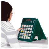 A girl using AAC symbols in her communication aid.
