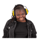 A woman in black clothes wearing yellow ear defenders.