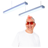 A man wearing tinted glasses to help with light sensitivity.