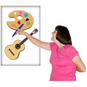 A woman pointing to a paint easel or a guitar.