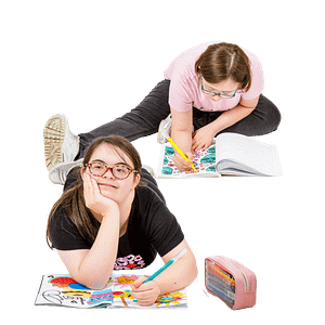 Two girls colouring in with felt pens.